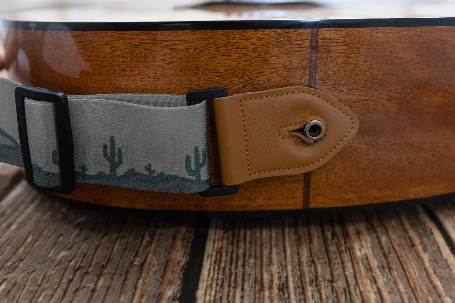 Trees, mountains and cacti printed guitar strap