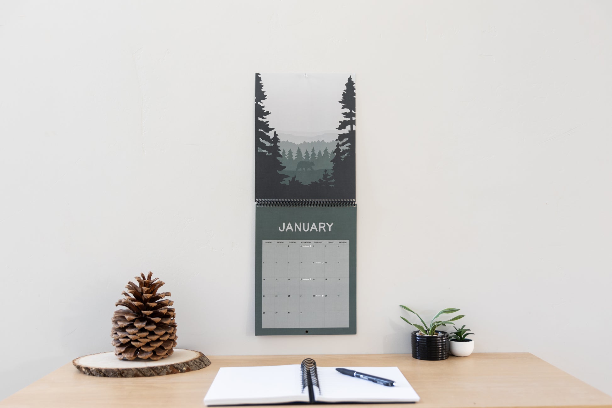 Bear in the woods, January of 2024 illustrated landscapes calendar by widtree