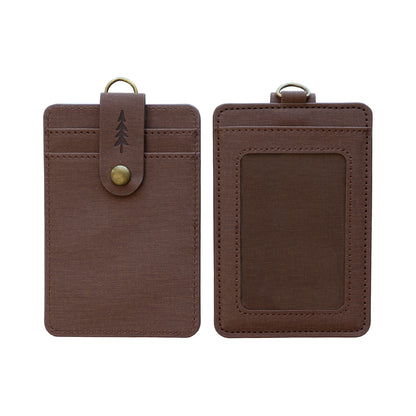 A product shot isolated on a solid white background showing the front and back of a brown textured ID badge holder side-by-side. The left side shows the front view with card slots and a snap-button closure strap embossed with a pine tree. The right side shows the back view with a clear ID window and top loop.