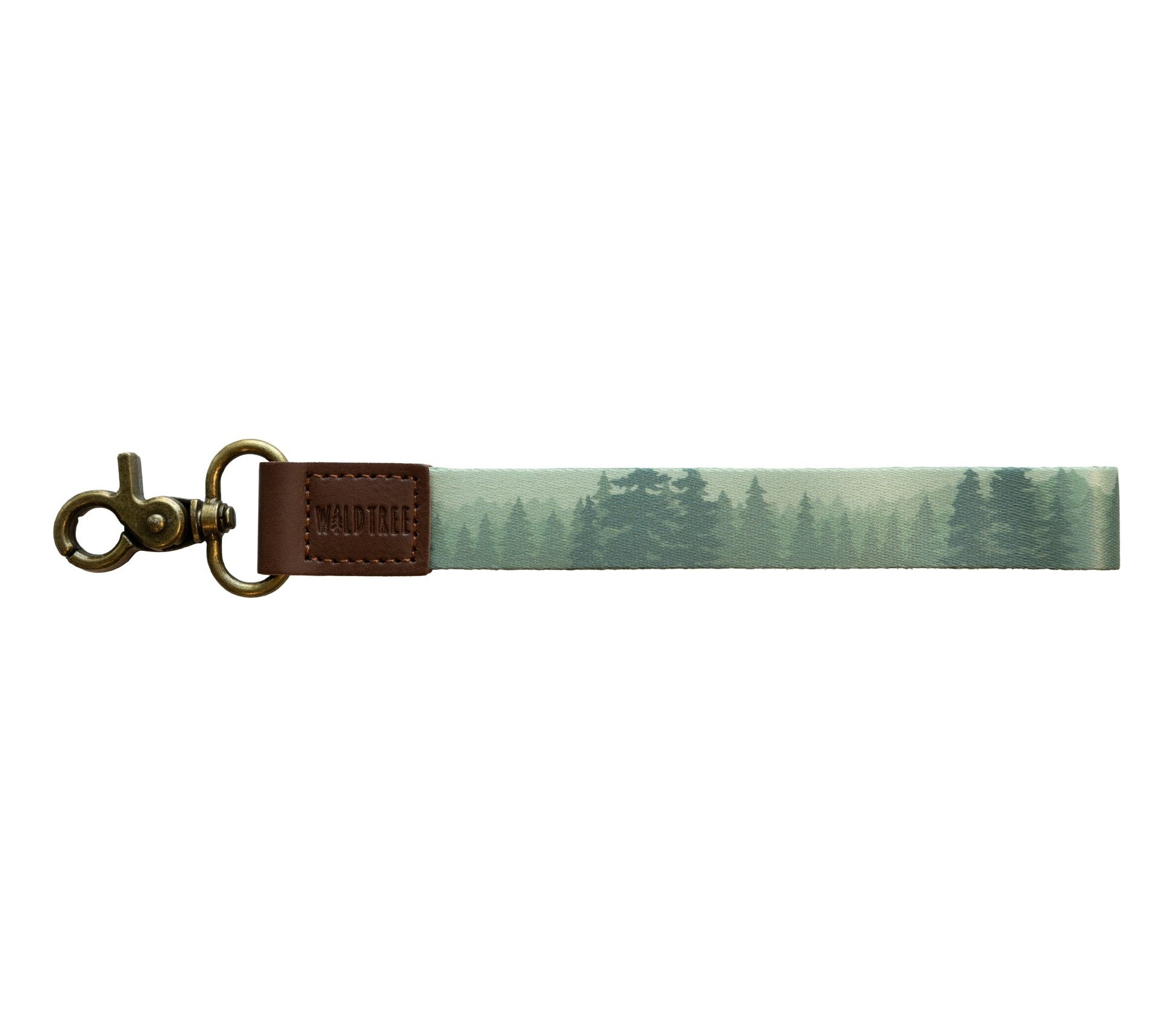 A product photo against a plain white background showing a wristlet keychain with a misty green forest print on a polyester strap.