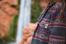 Load image into Gallery viewer, Havasu falls enamel pin attached to womens shirt
