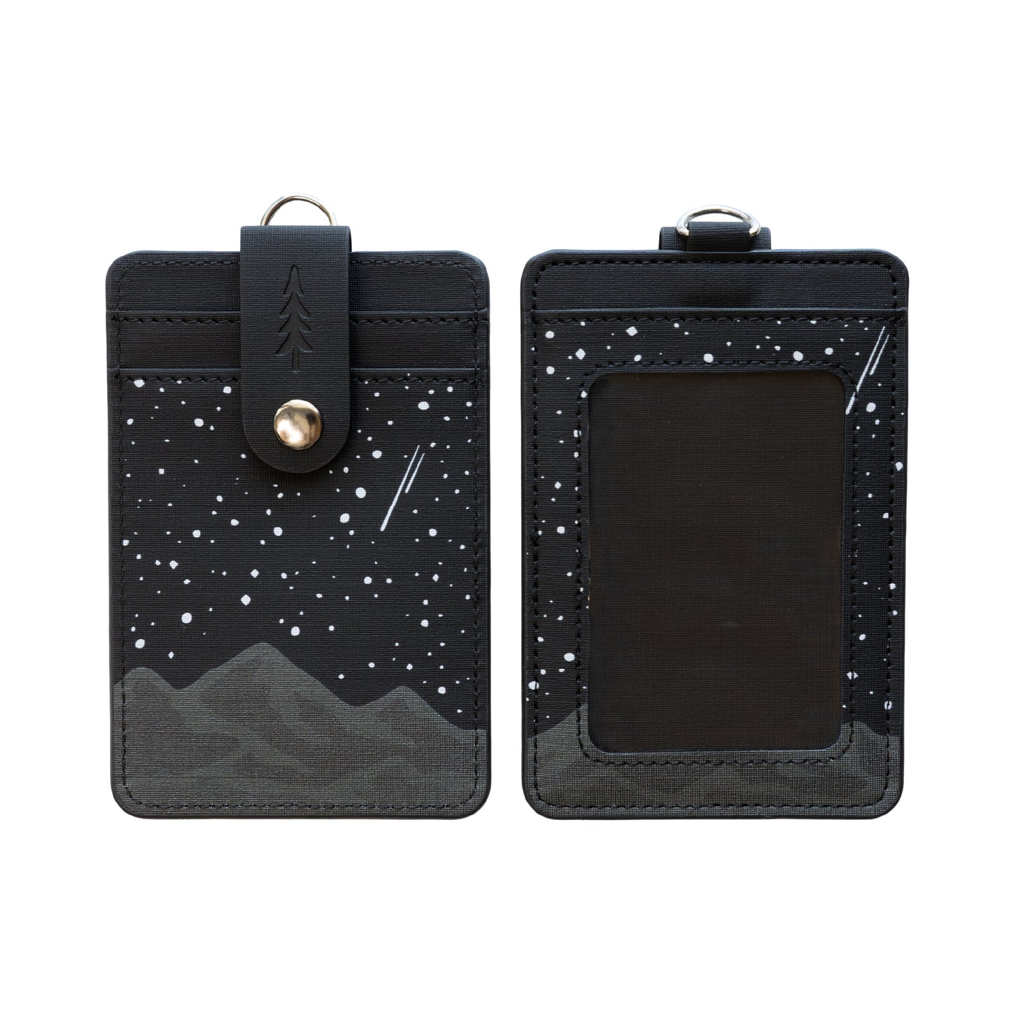 A detailed close-up shot focusing on the back details of the Midnight Mountain vertical card wallet while being worn outdoors. It beautifully frames the contrast between the dark gray mountain peaks, the white stars on black fabric, and the brown faux-leather strap securing the hidden card pockets.