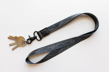 Load image into Gallery viewer, midnight mountain neck lanyard keychain attached to keys
