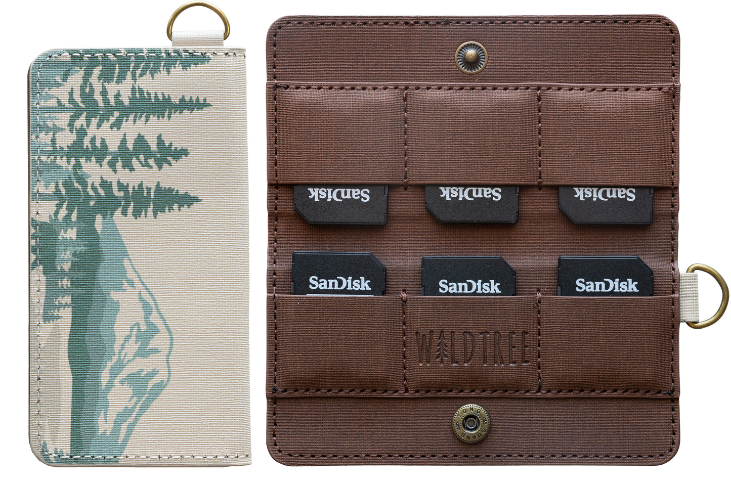 A studio product shot against a white background showing the closed front of the mountain-themed SD card holder next to the open interior containing six SanDisk memory cards.