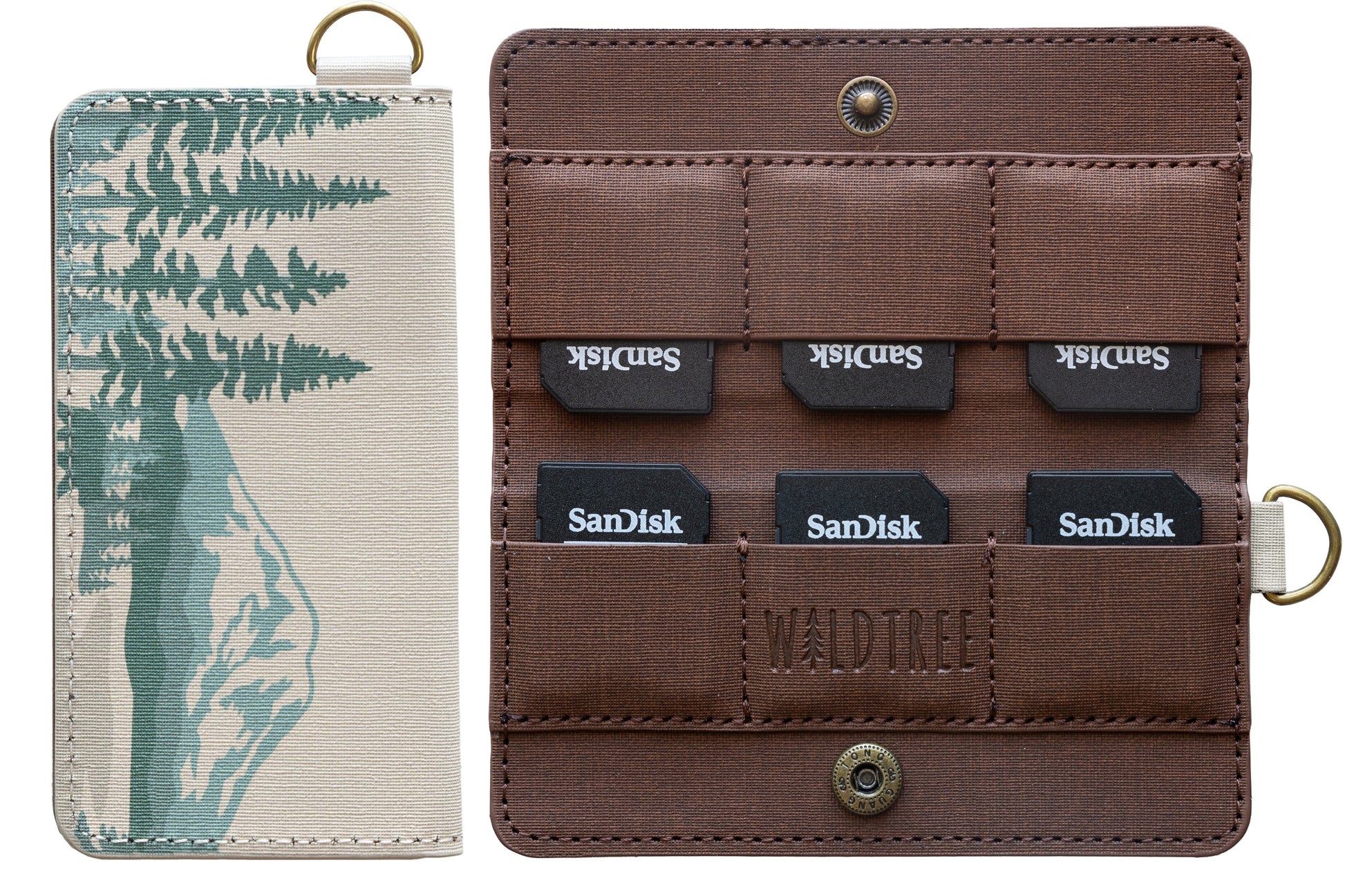 A studio product shot against a white background showing the closed front of the mountain-themed SD card holder next to the open interior containing six SanDisk memory cards.