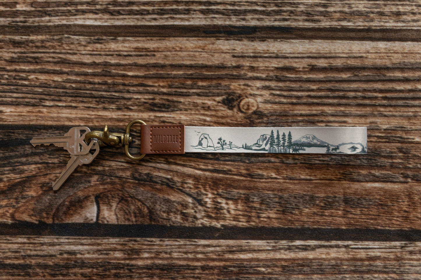 national park wristlet keychain laying on wood floor