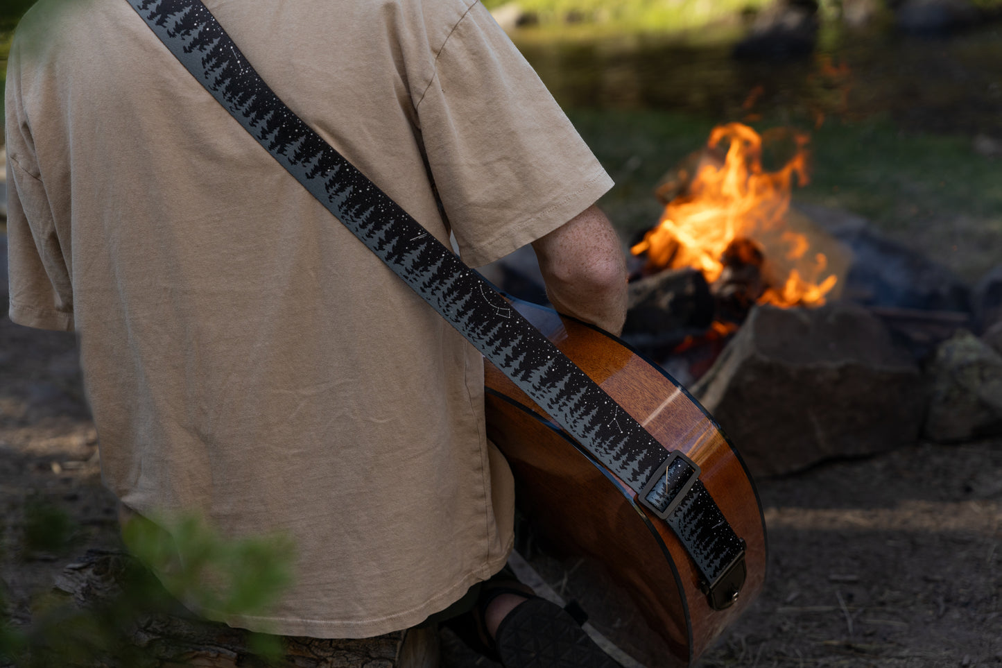 Night Sky guitar strap Trees and starry sky design outside around a campfire playing guitar