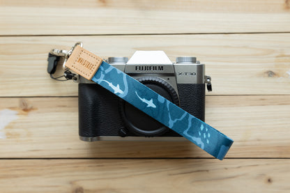 Ocean design wristlet keychain attached to Fujifilm camera