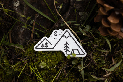 Simplistic line art sticker designed with mountains, trees, camping tent, stars and moon