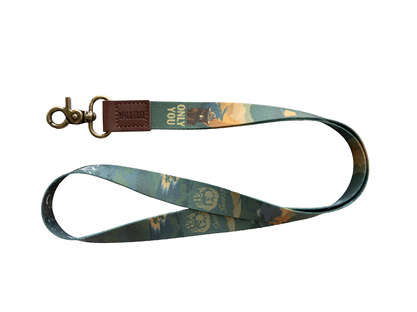Product photography of the Smokey Bear lanyard on a plain white background, laid out to show the double-sided print featuring forest scenery, Smokey Bear, and the moon and stars.
