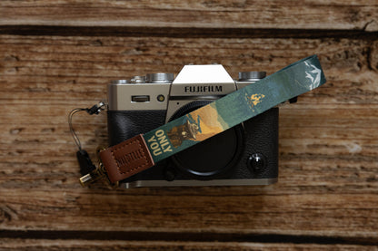 Smokey bear wristlet keychain connected to light weight camera