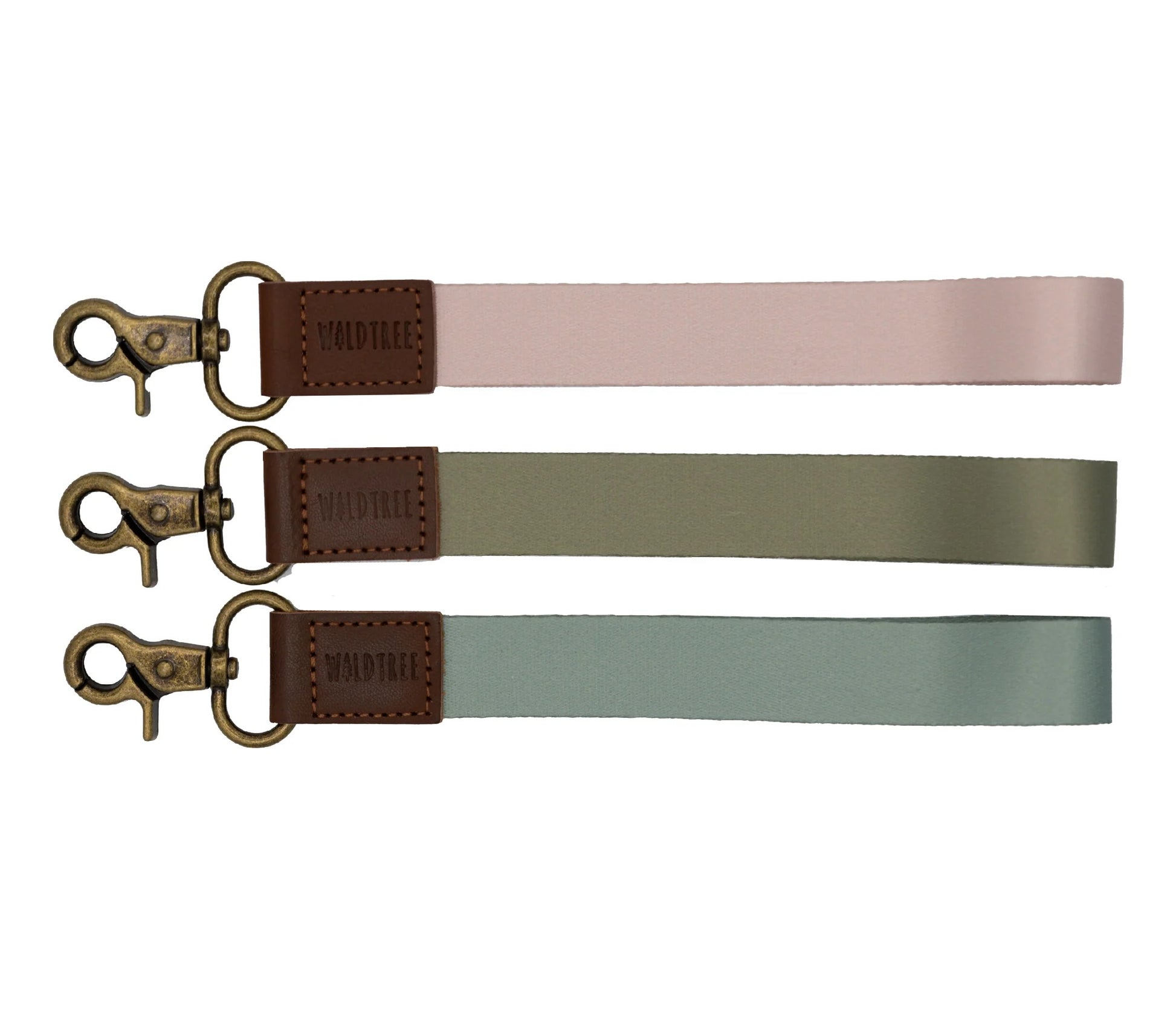 image of three wristlet keychains with bronze hook hardware. pink, green and blue