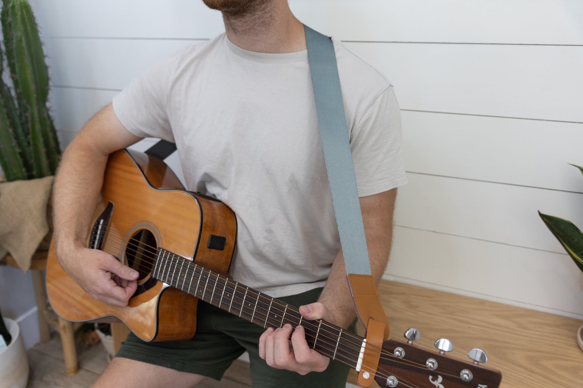 blue colored guitar strap