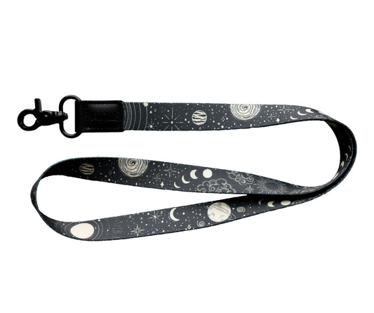 Black neck lanyard with Sun, moon, and stars pattern