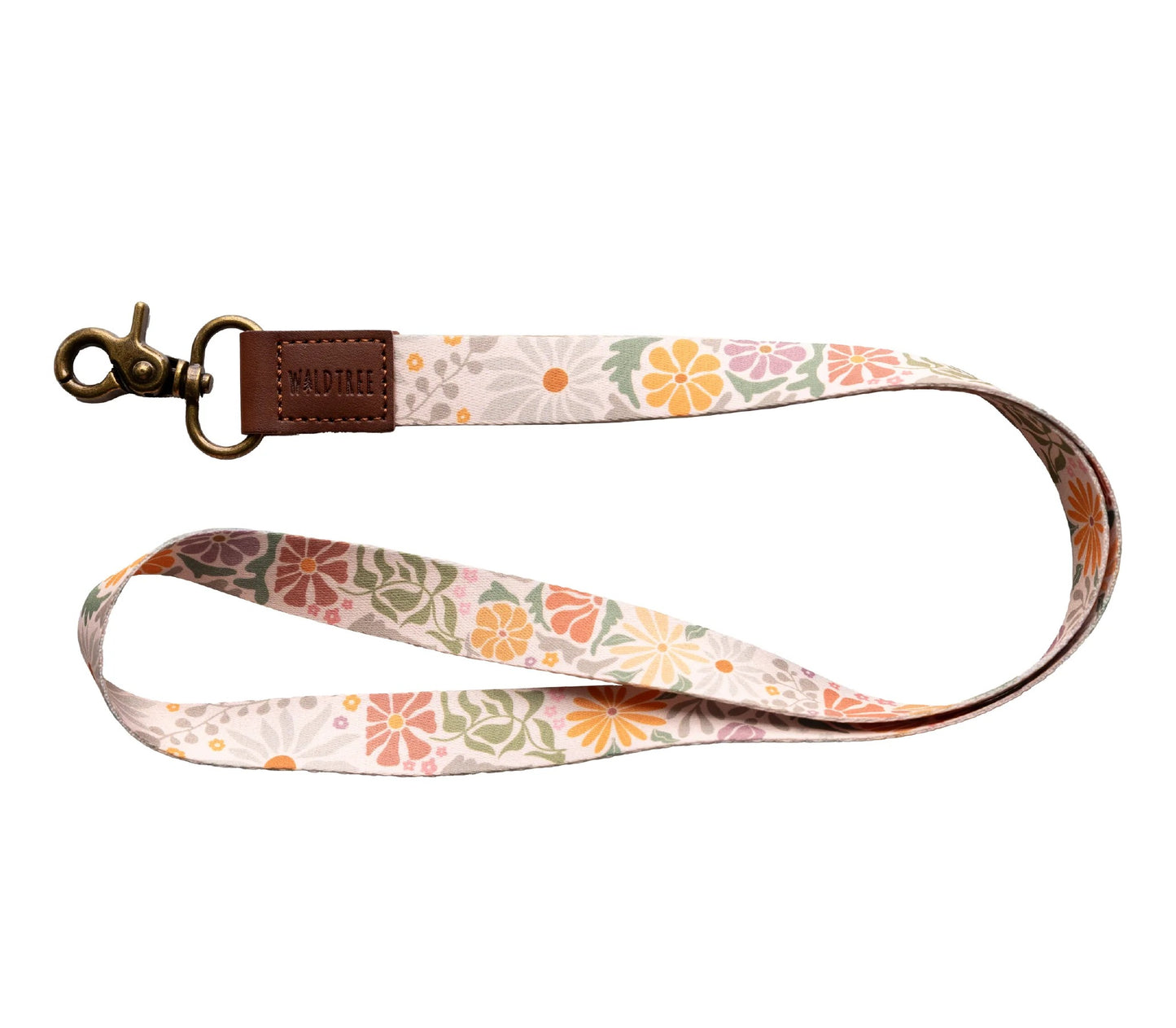 "Wildtree sunset flower neck lanyard" on white. Light tan strap with orange, pink, and muted green stylized flowers. Brown leather loop ("WILDTREE") attaches to a bronze swivel clasp. Curved to display the vibrant floral design.