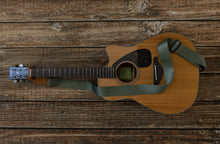 Load image into Gallery viewer, Woodland Green colored guitar strap attached to acoustic guitar
