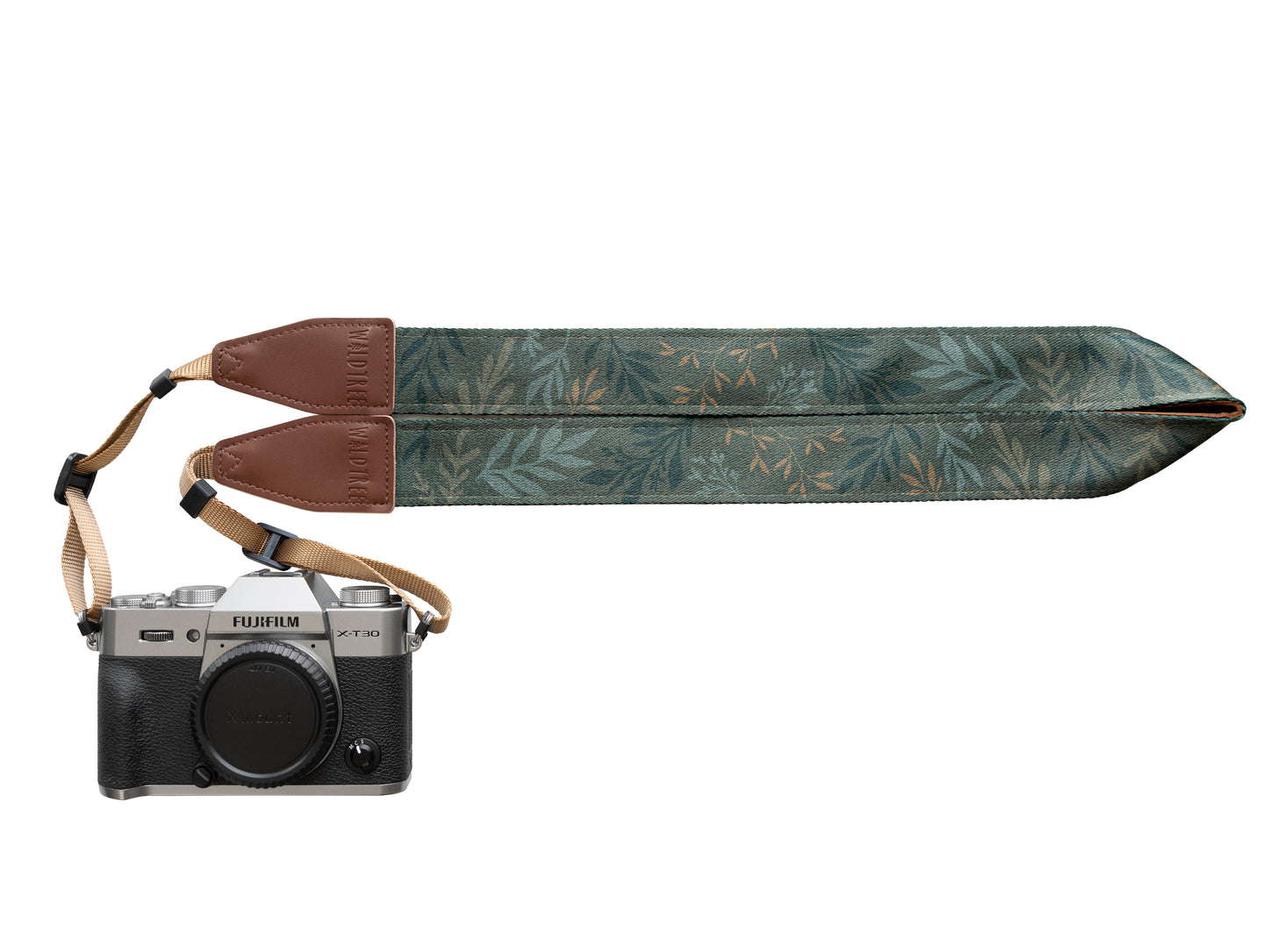 Studio shot of the "Silent Grove" floral camera strap attached to a Fujifilm camera on a plain white background.