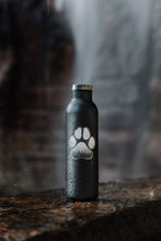 Load image into Gallery viewer, Wildtree Paw sticker on water bottle sitting on ledge
