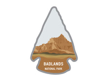 Load image into Gallery viewer, National park arrowhead shaped stickers of different parks in color badlands
