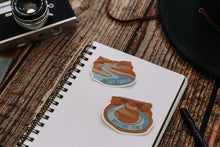Load image into Gallery viewer, Wildtree Lake Powell Sticker and Horseshoe bend sticker sitting on notepad
