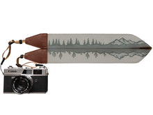 Load image into Gallery viewer, Wildtree Landscape Camera Strap with trees, Cacti and Mountains connected to canon camera
