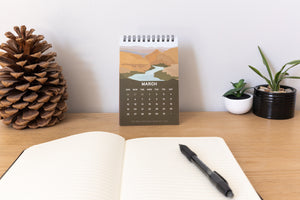 2023 national park calendar sitting up on desk
