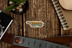 Smokey Bear Only You Sticker laying on wood background