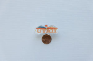 Wildtree Utah pin with penny for size comparison 