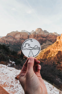 Hand holding Monument Valley Sticker 