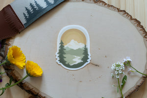 Wildtree Mountain Morning Sticker featuring mountains trees and river