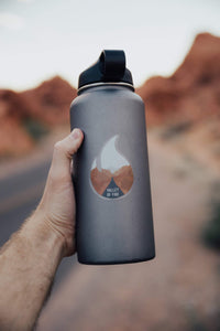Wildtree Valley of Fire State Park Sticker on Hydro Flask being held out