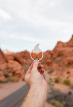 Load image into Gallery viewer, Hand holding Wildtree Valley of Fire State Park Sticker
