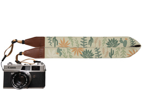 Wildtree camera strap wild desert design featuring cacti, succulents and other desert plants 