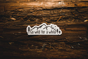 wildtree go wild for a while black and white sticker design on woordbackground