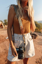 Load image into Gallery viewer, Wildtree Smokey Bear Camera Strap attached to film camera around women&#39;s shoulder
