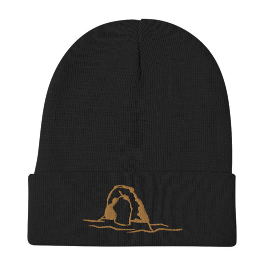 black knit beanie with design of delicate arch 