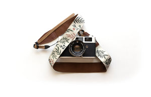 wildtree green and pink Moody Flower Camera Strap botanical flowers print attached to camera