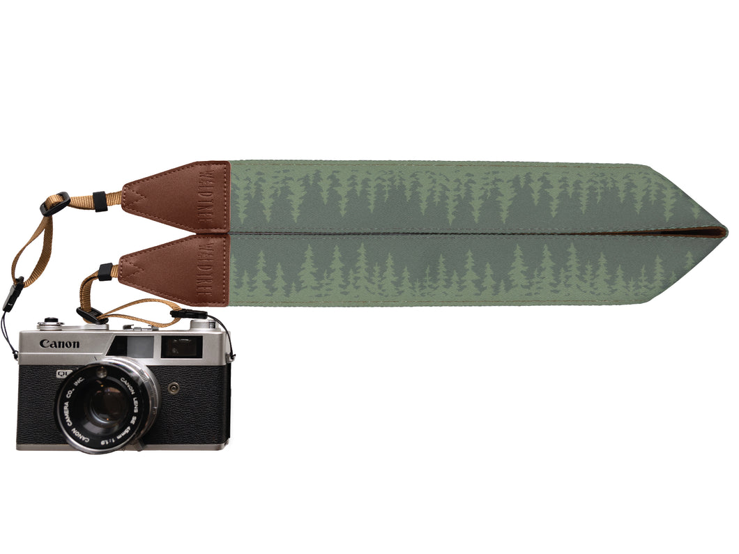 Wildtree Pine tree Camera strap featuring green tree-line attached to Canon film camera