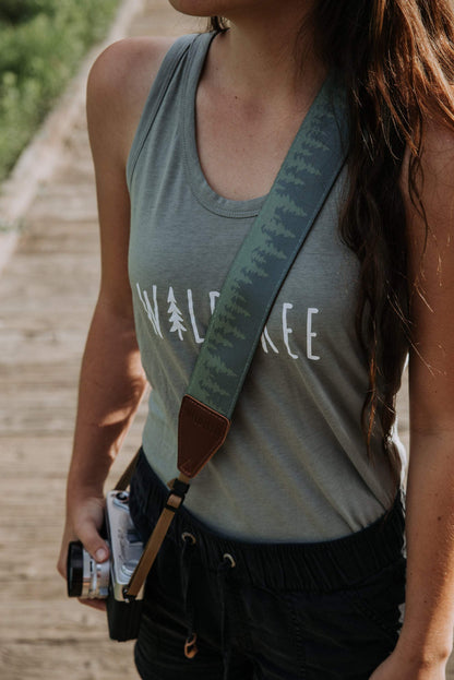 Women wearing pine tree designed camera strap cross bodied 