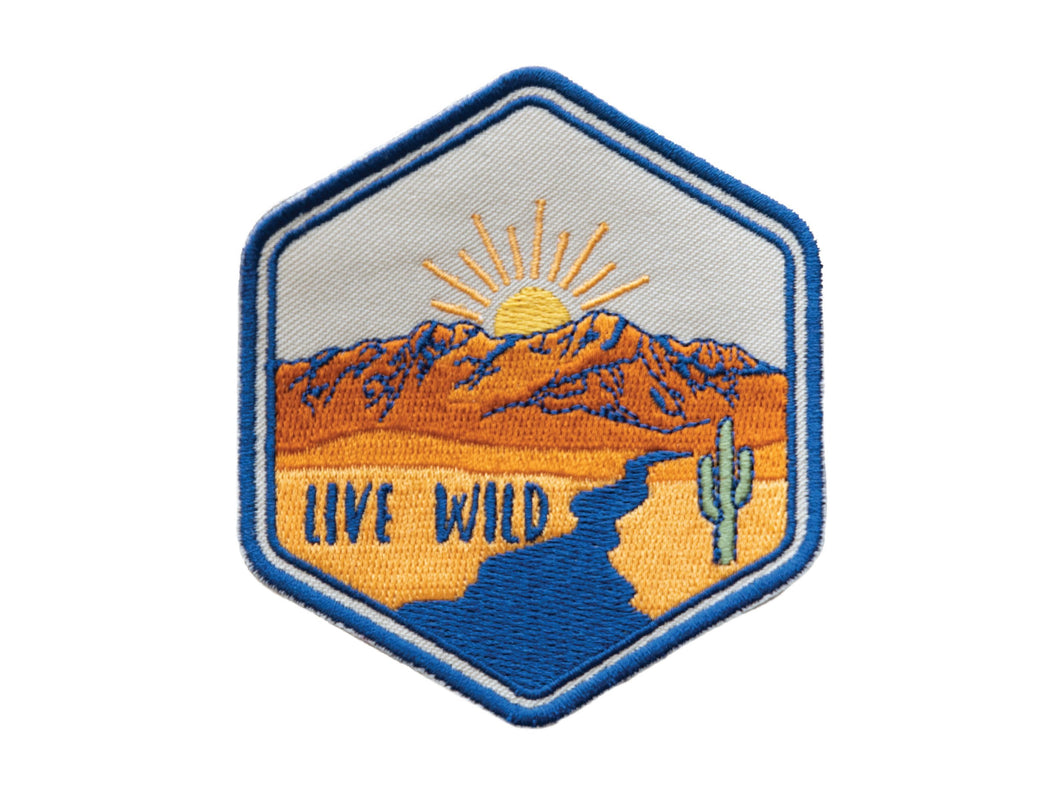 wildtree iron on patch hexagon shape live wild red rock mountains blue river cactus and sun
