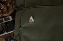 Load image into Gallery viewer, Zion National Park pin in shape of arrow head pinned on backpack
